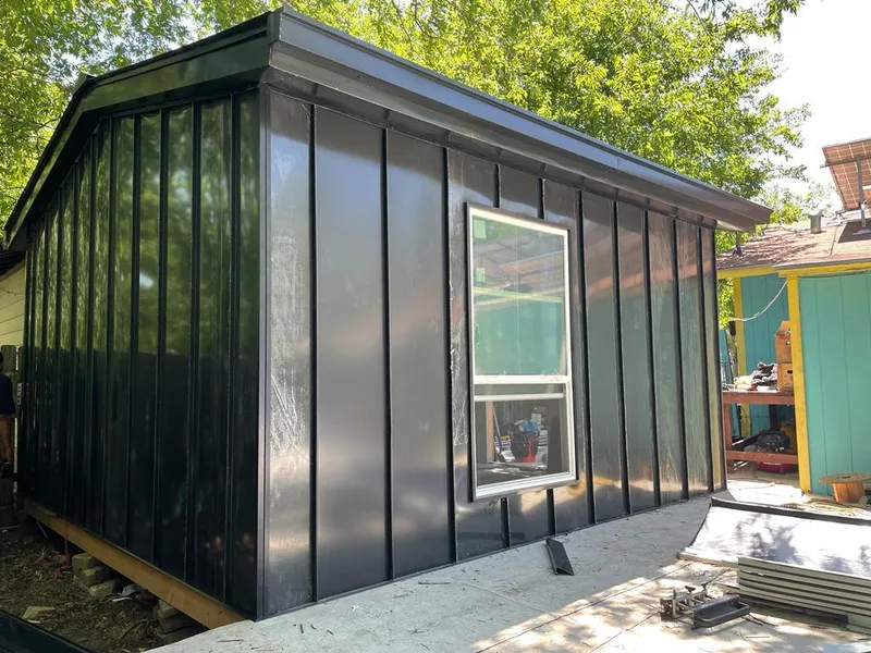 Black standing seam metal wall panels for Roof Inspection in Beeville