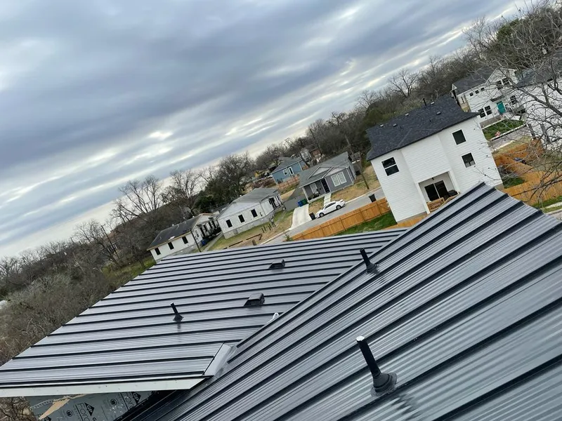 Standing seam metal roof panels with vents for Skylight Repair in Beeville